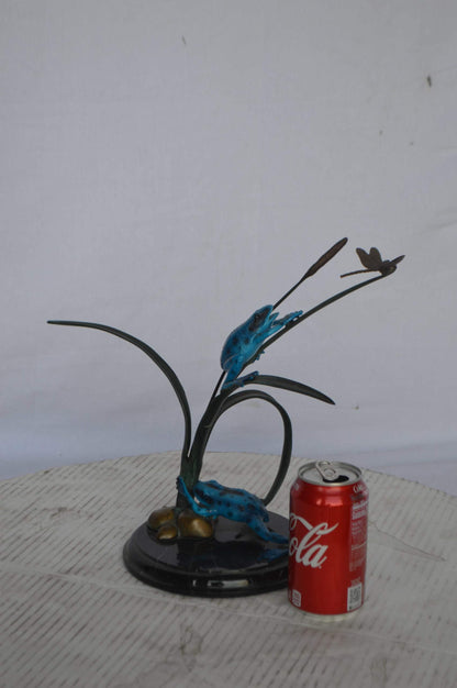 Two Blue Frogs catching a dragonfly Bronze Statue - Size: 14"L x 8"W x 12"H.