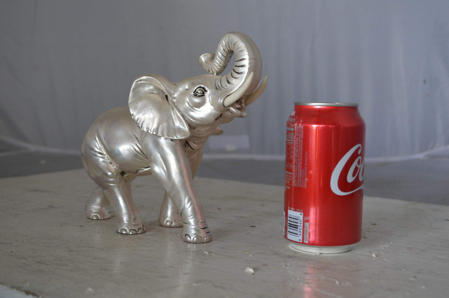 Elephant statue made of resin - Size: 9"L x 4"W x 8"H.