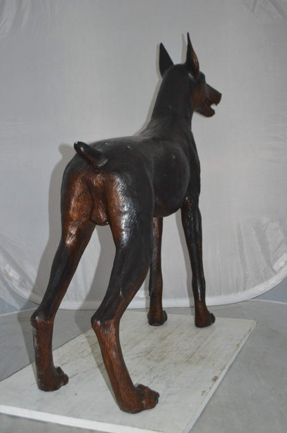 Doberman Dog Bronze Statue -  Size: 36"L x 9"W x 38"H.