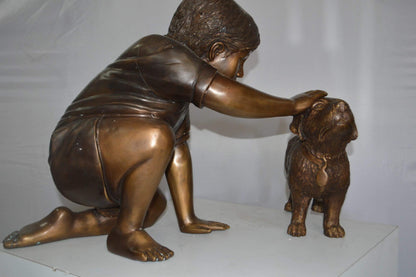 Boy and Dog Bronze Statue - Size: 30"L x 18"W x 18"H.