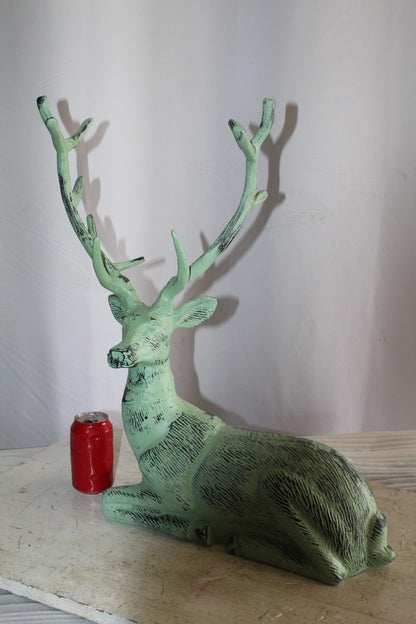 Aluminum Deer Statue Green Patina Resting on the ground 26" x 7" x 24"H