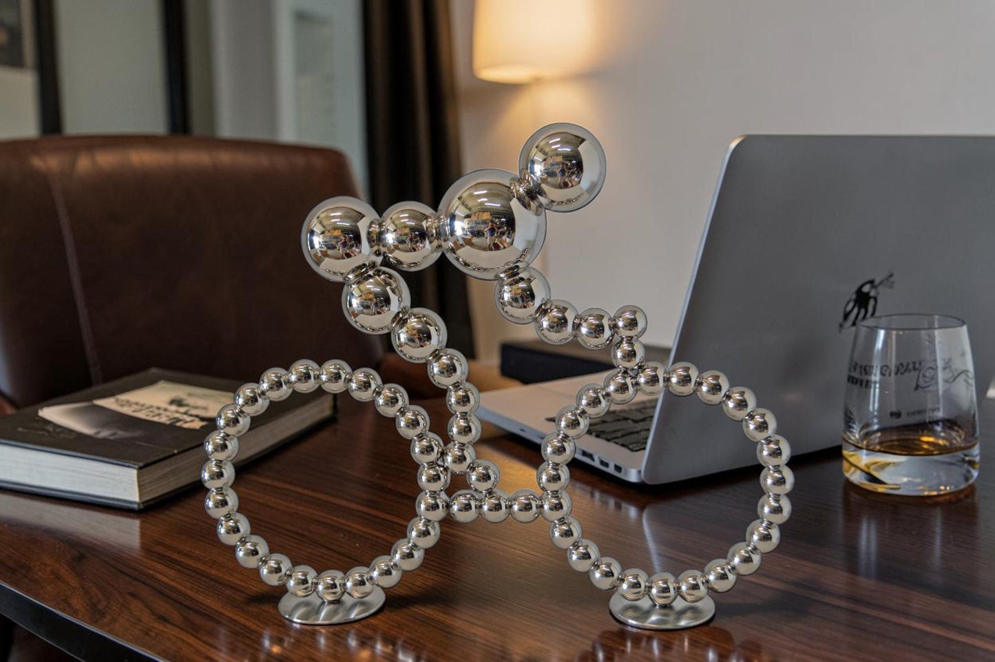 Modern Art Rider on His Bicycle Chrome Statue - Size: 22"L x 4"W x 17"H.