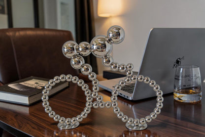 Modern Art Rider on His Bicycle Chrome Statue - Size: 22"L x 4"W x 17"H.