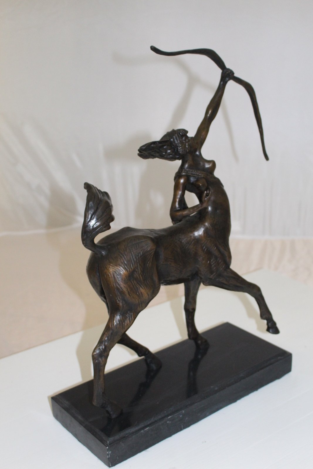 horse woman shooting an arrow Bronze Statue -  Size: 14"L x 6"W x 20"H.