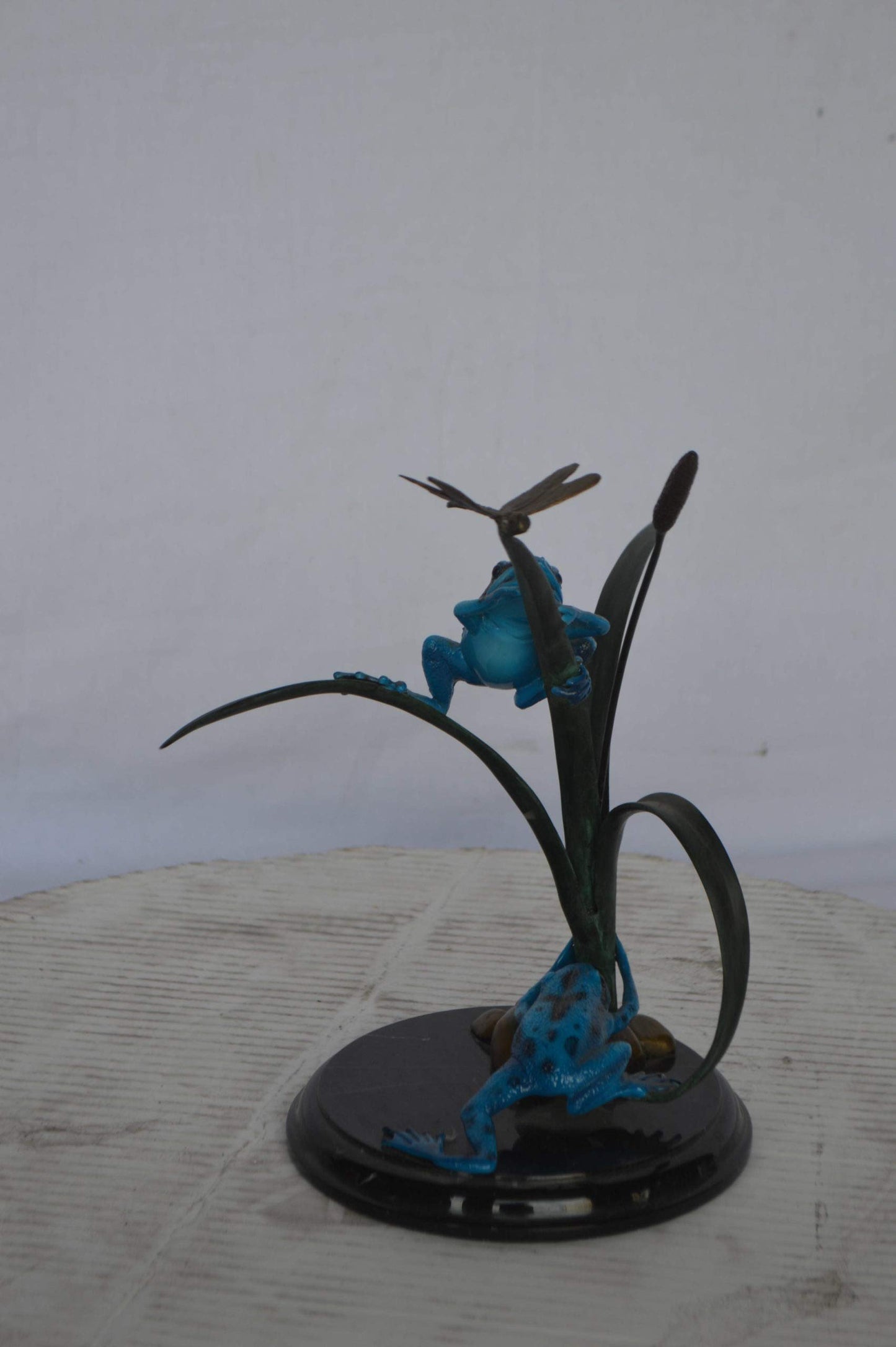Two Blue Frogs catching a dragonfly Bronze Statue - Size: 14"L x 8"W x 12"H.