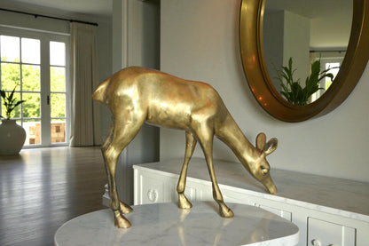 Two Tone color deer bronze statue -  Size: 13"L x 4"W x 11"H.