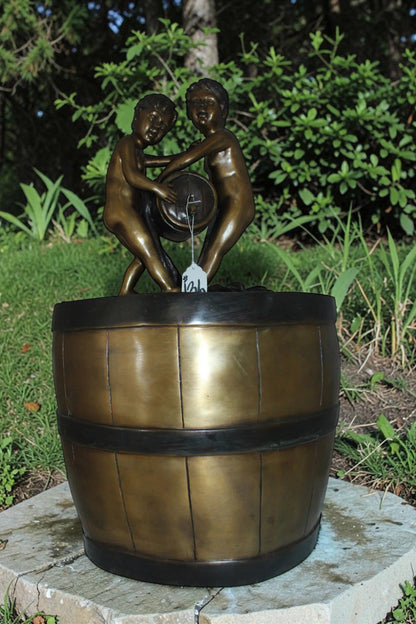 Two boys on a bucket self-contained fountain bronze statue -  16" x 16" x 29"H.