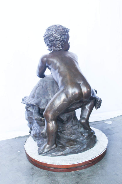 Naked toddler on turtle bronze statue Art Nude -  Size: 23"L x 26"W x 34"H.
