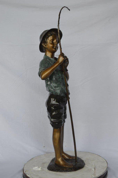Boy with fishing rod  bronze statue -  Size: 11"L x 14"W x 44"H.