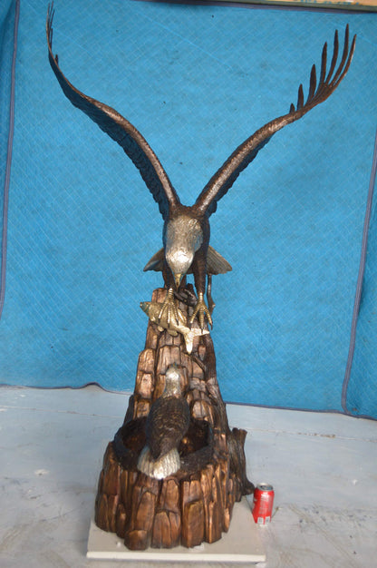 Eagle with nest Bronze Statue -  Size: 36"L x 40"W x 63"H.