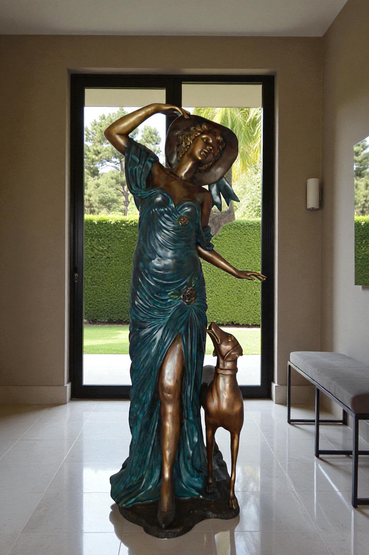 Lady With Her Dog Bronze Statue -  Size: 25"L x 22"W x 50"H.
