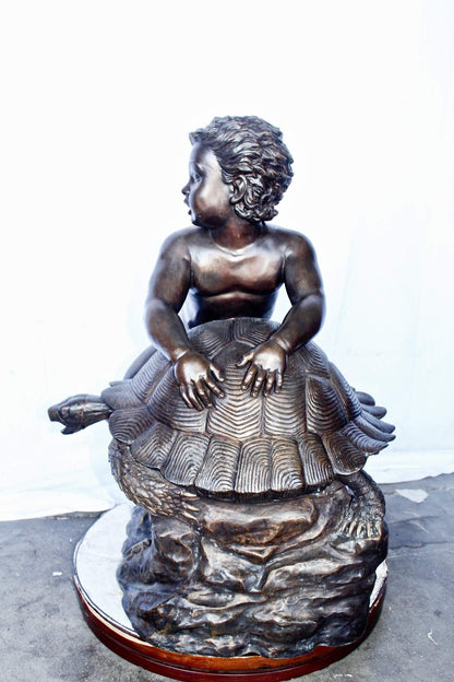 Naked toddler on turtle bronze statue Art Nude -  Size: 23"L x 26"W x 34"H.