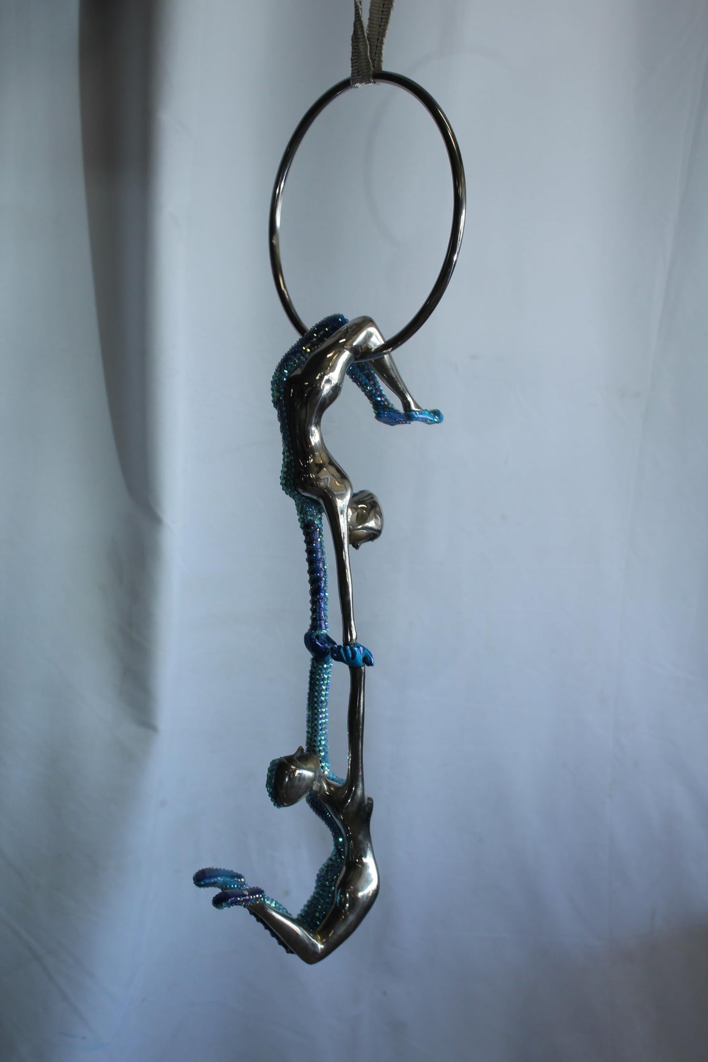 NIFAO Bronze Sculpture in The Ring of Light by Liliana Mendez 9"x9"x28"H