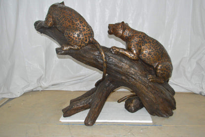 Two Jaguars On A Tree Bronze Statue - Size: 66"L x 34"W x 44"H.