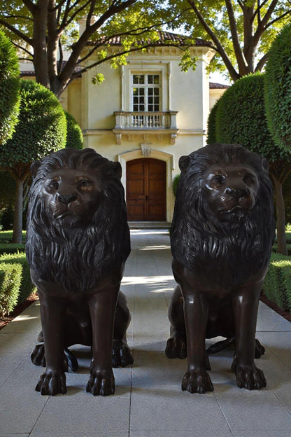 A Pair of Large Lions Sitting Side by Side Bronze Statues Size: 23" x 33" x 46"H