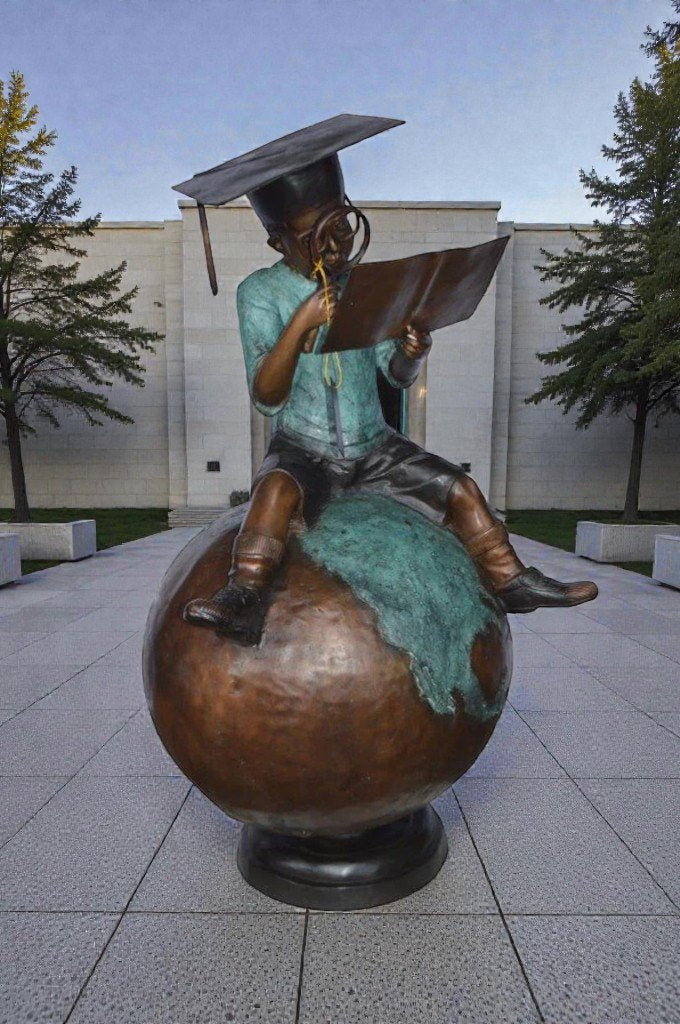 Student learning on top of world bronze statue -  Size: 28"L x 24"W x 52"H.