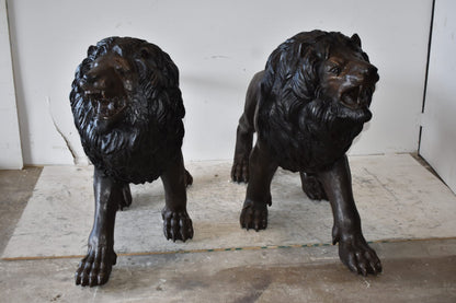 A Pair of Large Lions Walking Side by Side Bronze Statues Size: 24" x 60" x 41"H