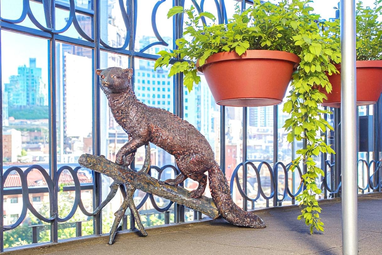 Bronze Statue of a Mongoose Climbing a Tree Branch 24" x 12" x 20"H