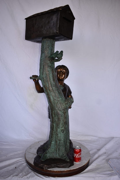 A Boy Standing by His Mailbox Looking at Birds Bronze Statue  25" x 22" x 51"H.