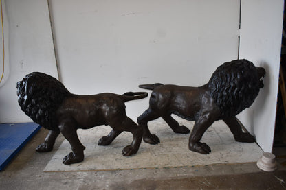 A Pair of Large Lions Walking Side by Side Bronze Statues Size: 24" x 60" x 41"H