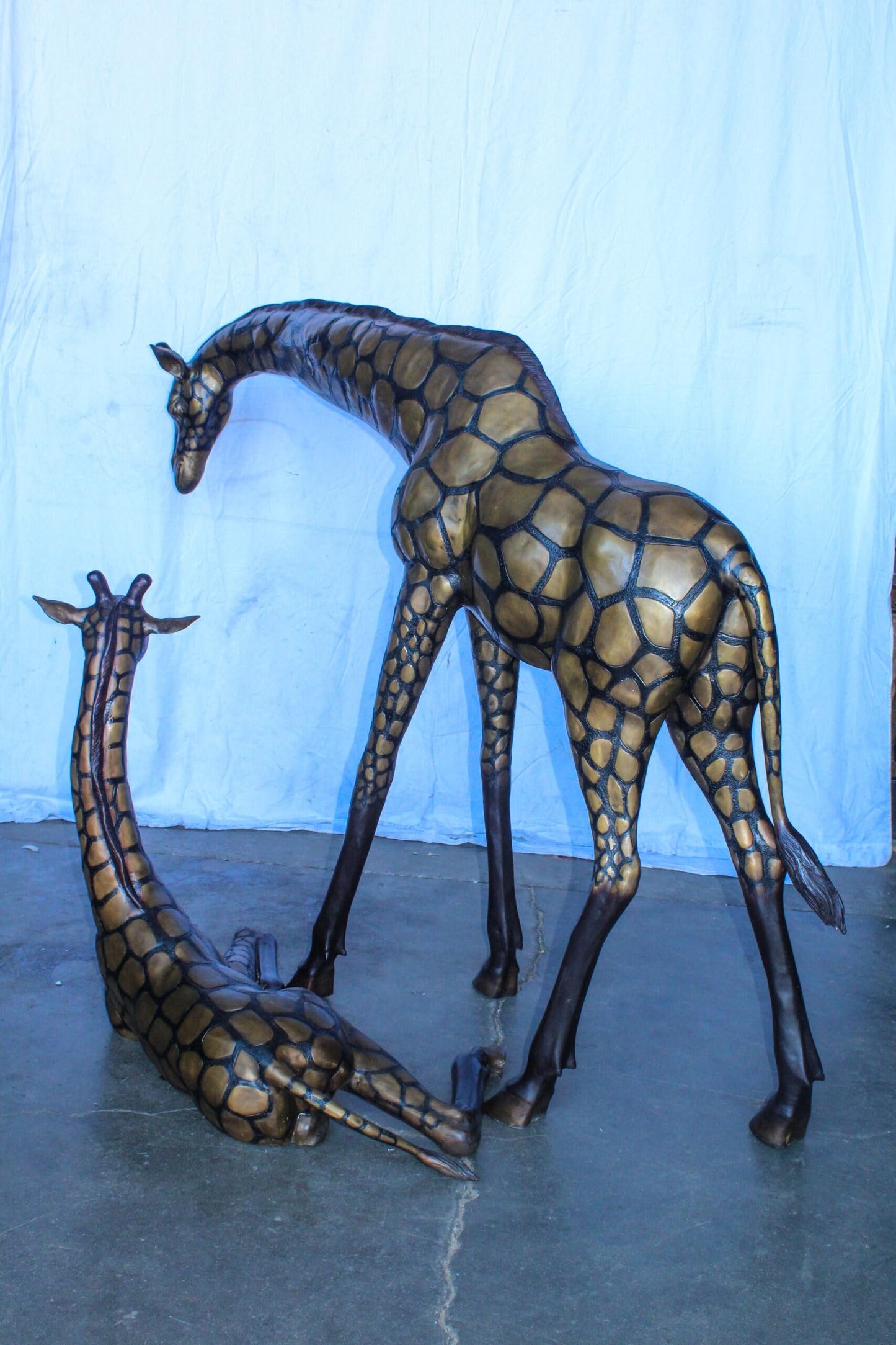 Life Size Bronze Giraffes Statues, One Laying, One Standing 77" x 21" x 58"H