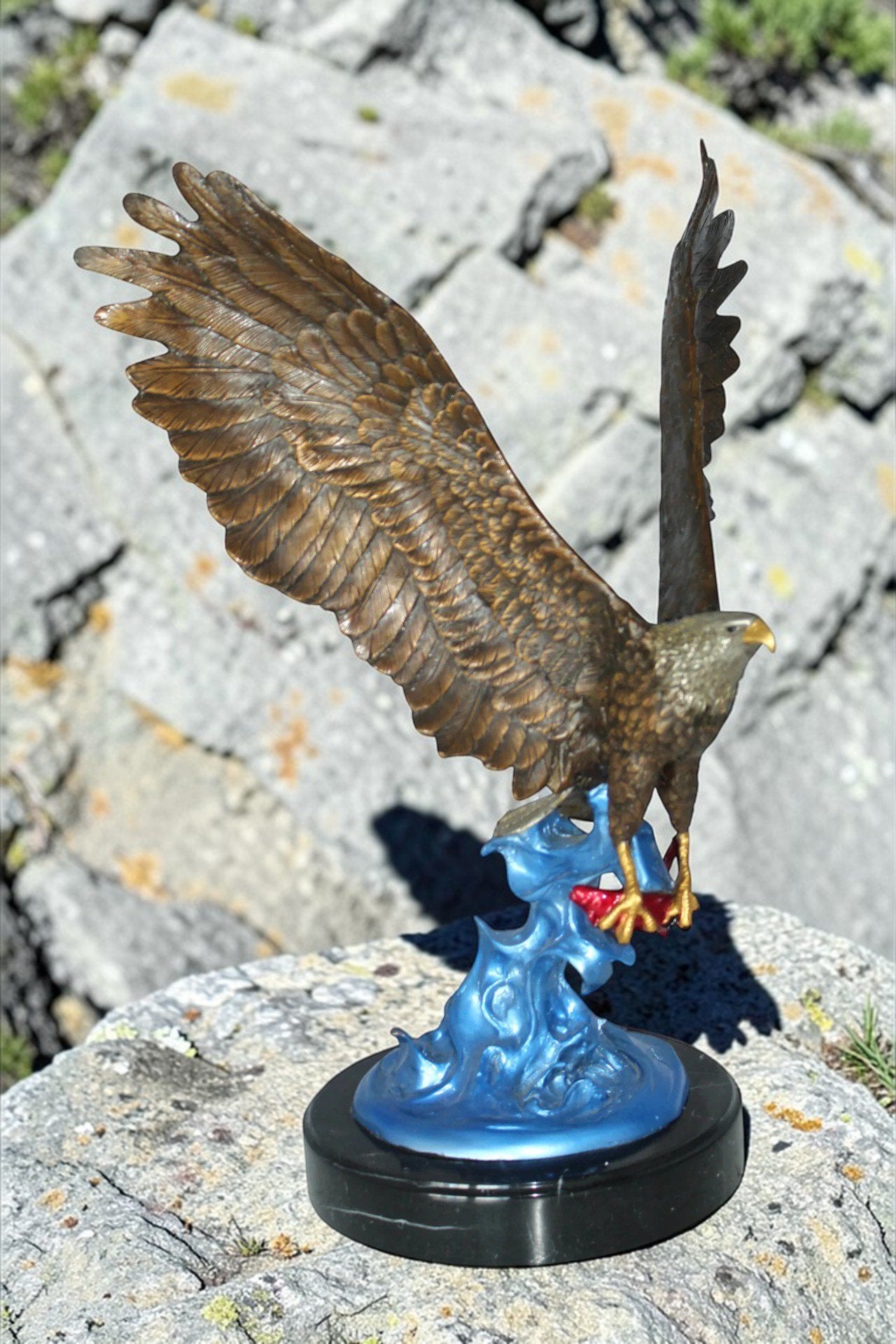 Eagle Catching his Prey Bronze Statue -  Size: 17"L x 20"W x 25"H.