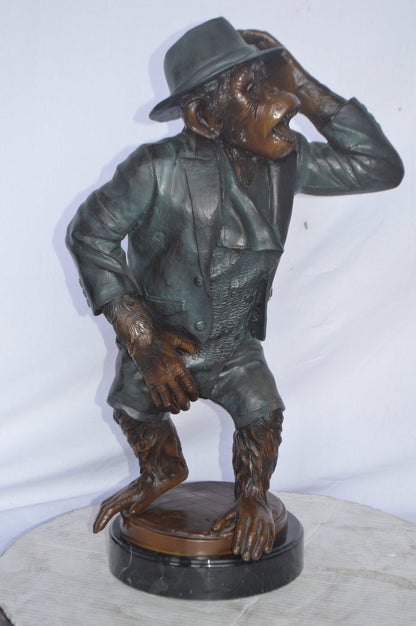 Monkey in Suit bronze statue - Size: 16"L x 10"W x 27"H.