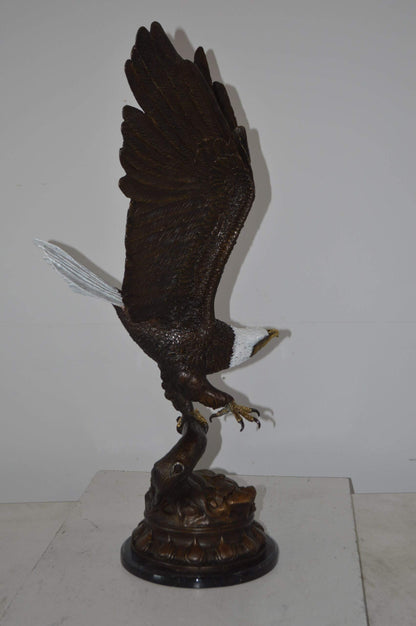 Eagle Coming to a Landing on a Branch Bronze Statue - Size: 15"L x 15"W x 31"H