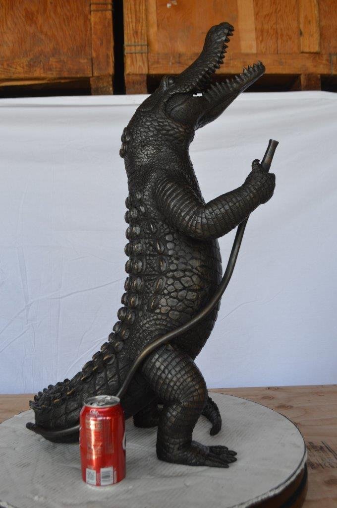 Alligator having fun bronze statue - fountain -  Size: 15"L x 15"W x 31"H.