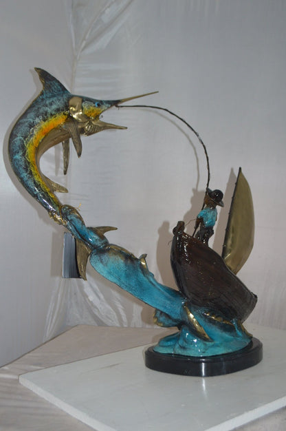 Old Man Fishing a Large Catch Bronze Statue -  Size: 27"L x 13"W x 30"H.