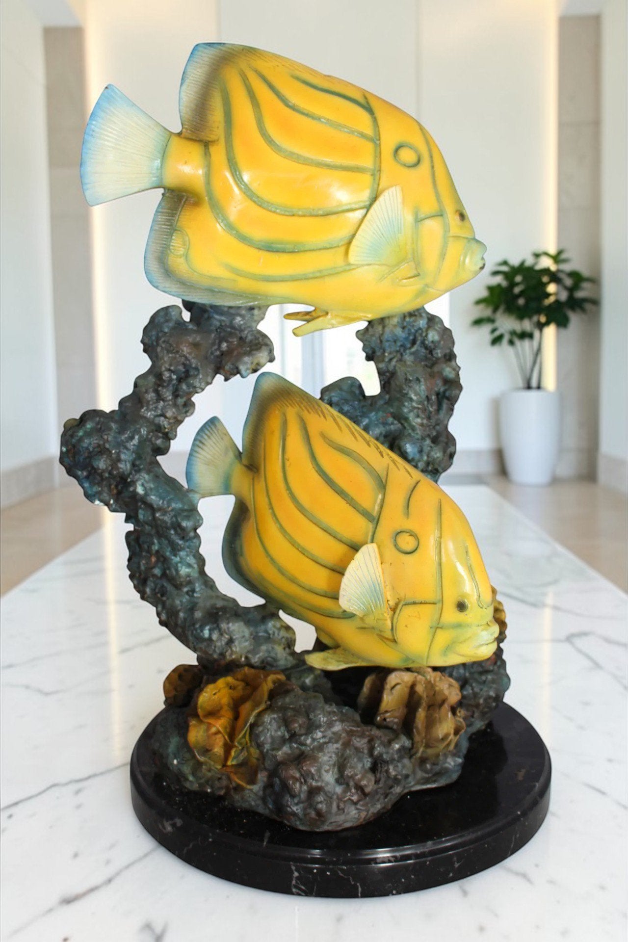 Two Butterfly fish swimming bronze statue -  Size: 12"L x 12"W x 24"H.