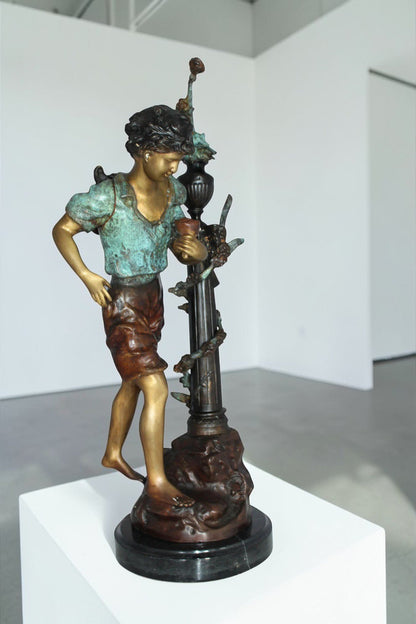 Les Amenes Boy Bronze Statue -  Size: 9"L x 8"W x 25"H.