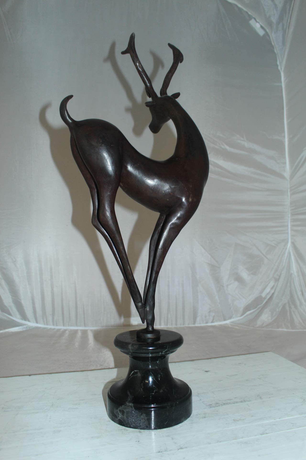 Deer standing Bronze Statue -  Size: 12"L x 7"W x 30"H.