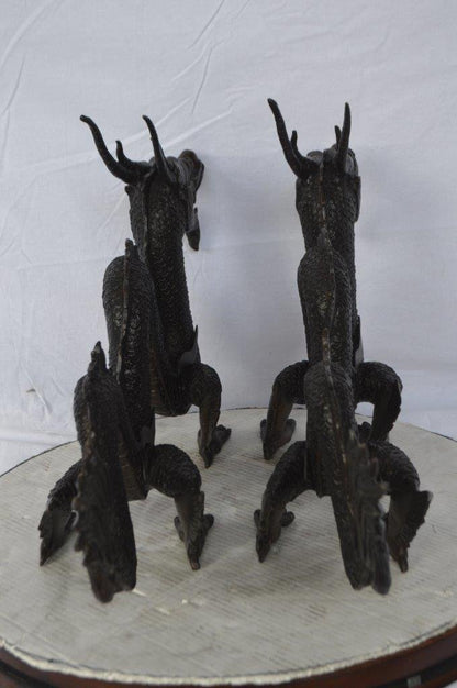 Pair of Dragons sitting side by side bronze statues -  Size: 31"L x 7"W x 16"H.