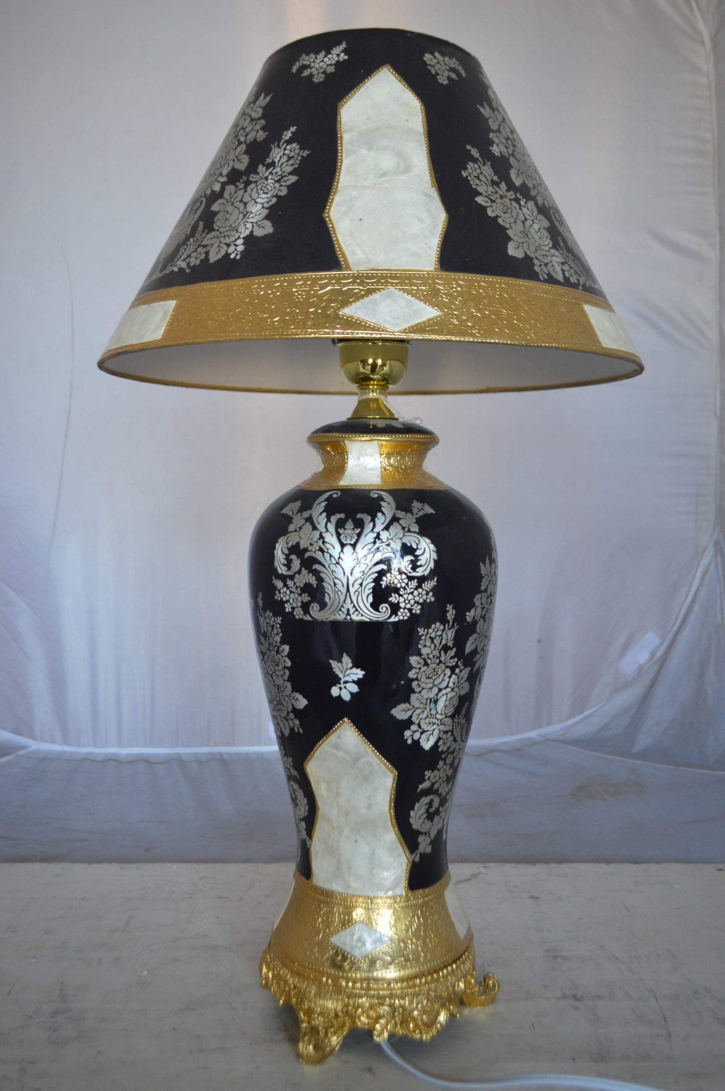 Gold and Silver lamp made of resin -  Size: 18"L x 18"W x 30"H.