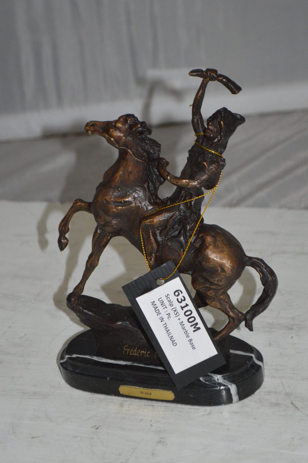 Scalp By Remington Bronze Statue -  Size: 3"L x 7"W x 10"H.