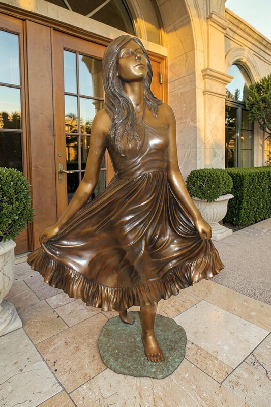 Lady holding her Skirt Bronze Statue -  Size: 32"L x 17"W x 53"H.