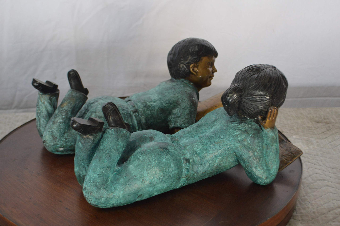 Set of a Boy and a Girl Reading a Book Bronze Statue -  Size: 16"L x 7"W x 8"H.