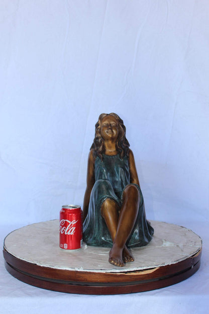 Fairy angel sitting peacefully bronze statue -  Size: 27"L x 12"W x 16"H.