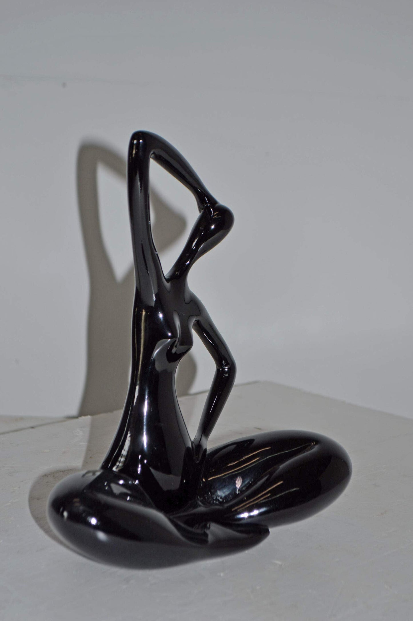 Modern Art Black Ballet Dancer Sitting Resin Statue - Size: 9"L x 5"W x 11"H.