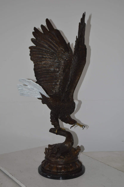 Eagle Coming to a Landing on a Branch Bronze Statue - Size: 15"L x 15"W x 31"H
