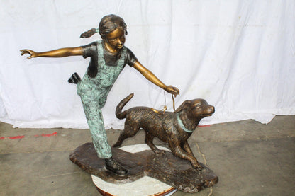 Young Girl and Her Dog Playing Bronze Statue 53" x 21" x 40"H