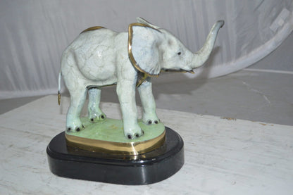 Elephant trunk Up Bronze Statue -  Size: 16"L x 9"W x 10"H.