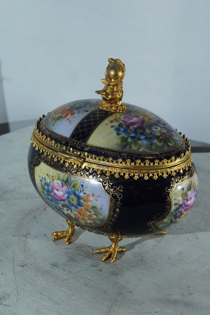 NIFAO Porcelain floral egg shaped lidded box with cherub and chicken feet 11"x8"x12"H