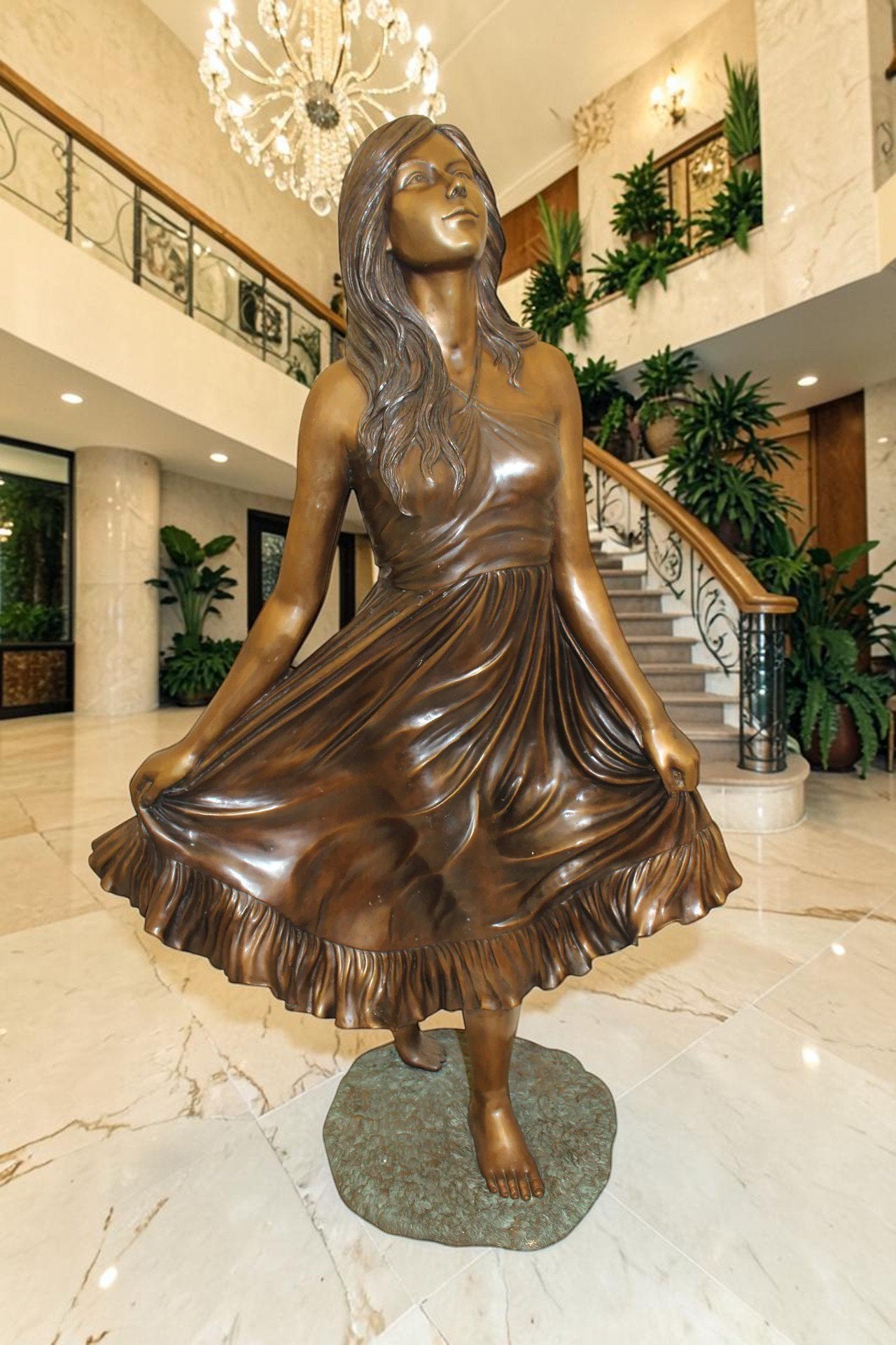 Lady holding her Skirt Bronze Statue -  Size: 32"L x 17"W x 53"H.
