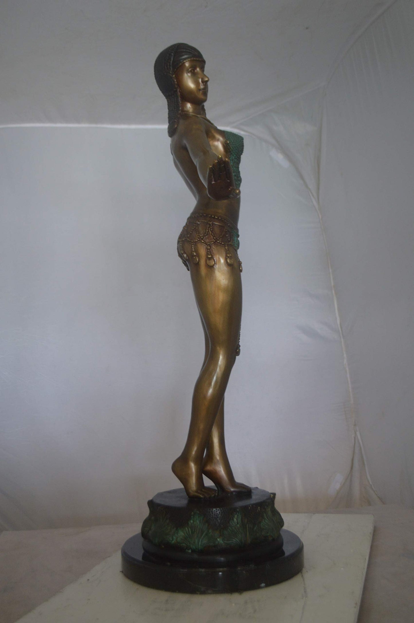 Belly Dancer Performing Bronze Statue -  Size: 32"L x 8"W x 41"H.