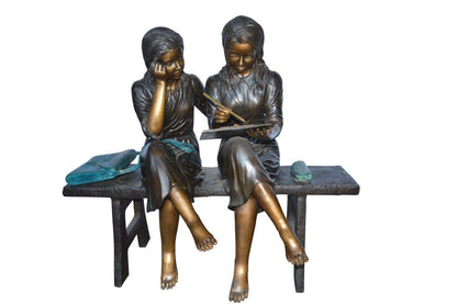 Two Schoolgirls Sitting On a Bench Bronze Statue -  Size: 45"L x 24"W x 41"H.