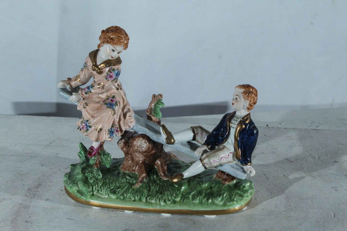 NIFAO Porcelain boy and Girl on Seesaw Figurine Vintage Style 10"x4"x9"H