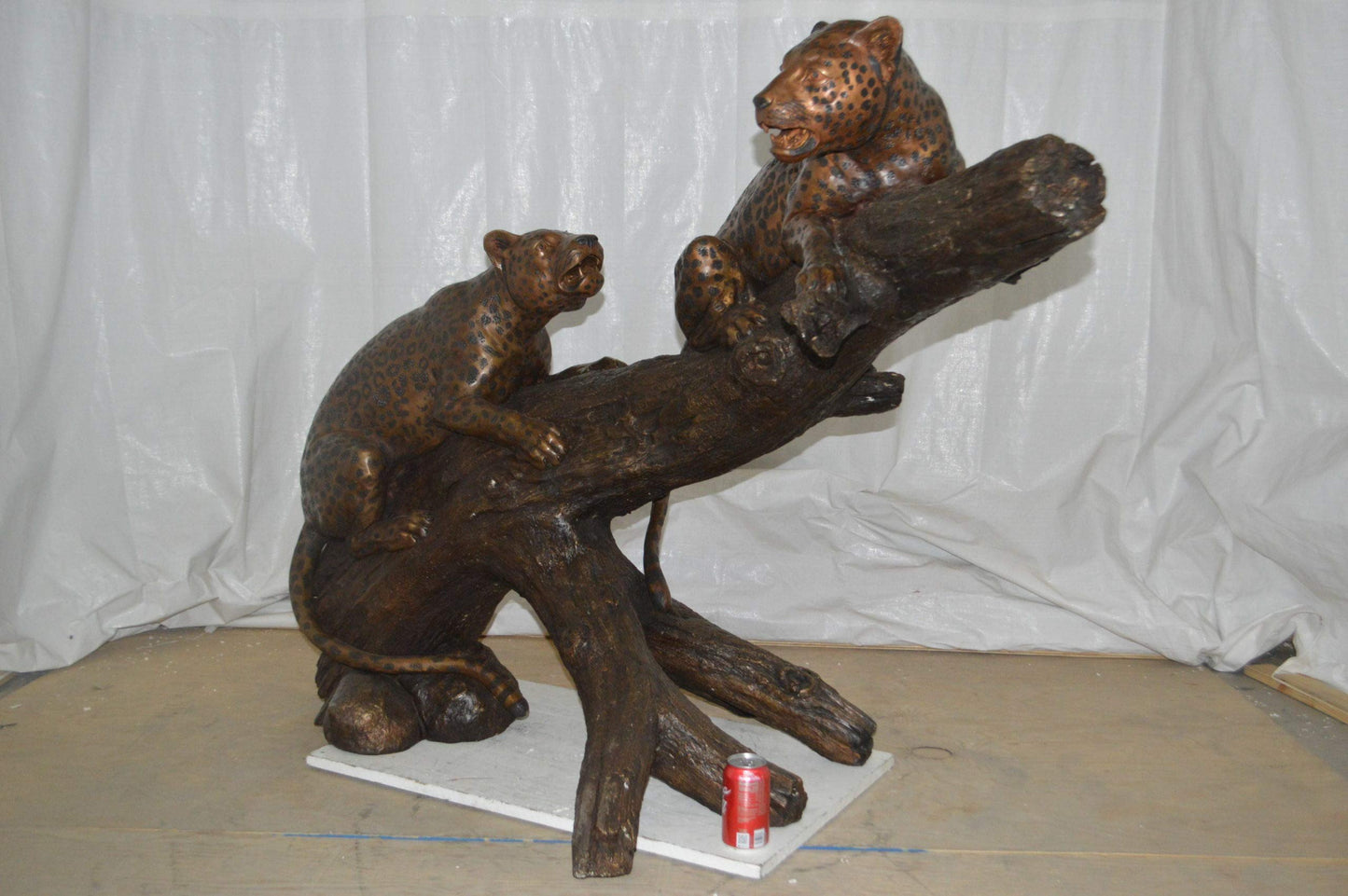 Two Jaguars On A Tree Bronze Statue - Size: 66"L x 34"W x 44"H.