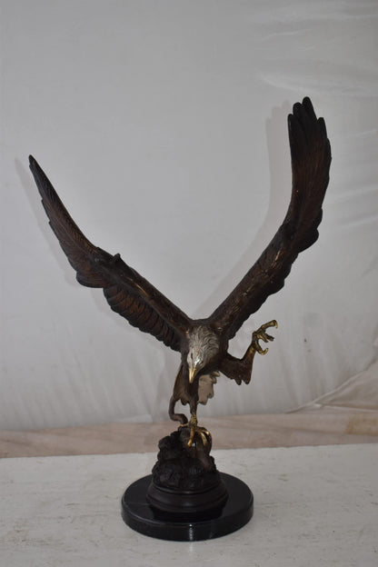 Eagle In Action Trying to Catch His Prey Bronze Statue Size: 17" x 10" x 23"H
